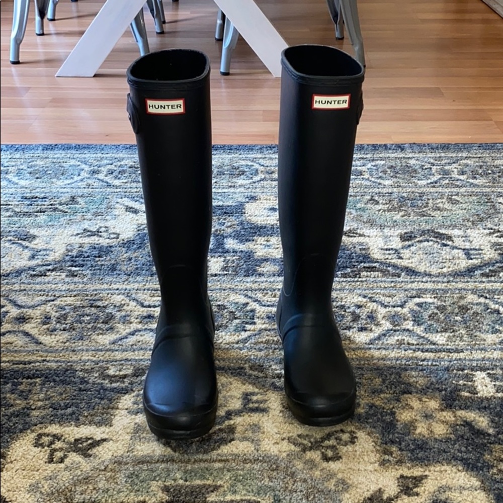 Tall black hunter rain boots